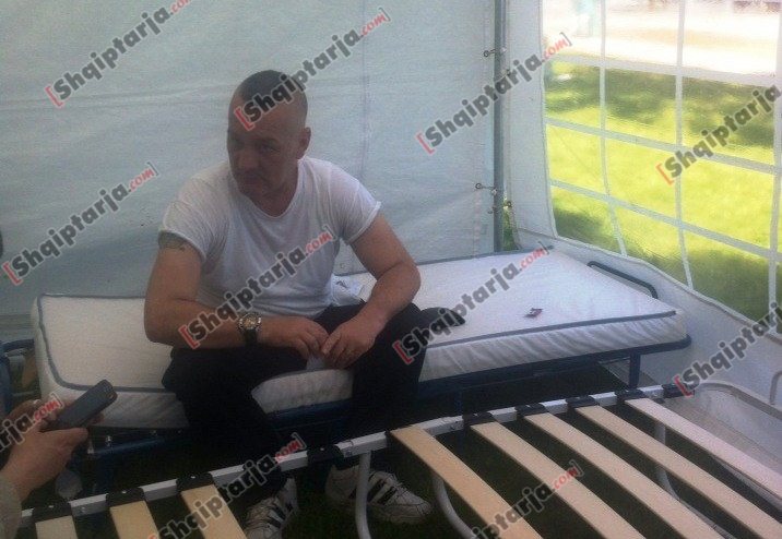 edmond idrizi i sakte me logo