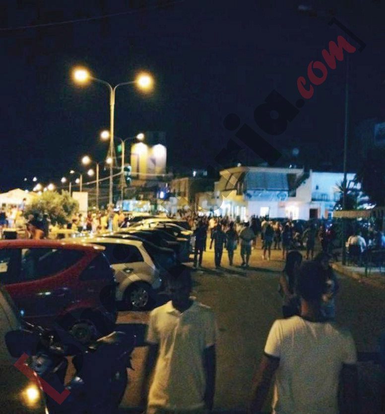 Pamje nga Himara me logo